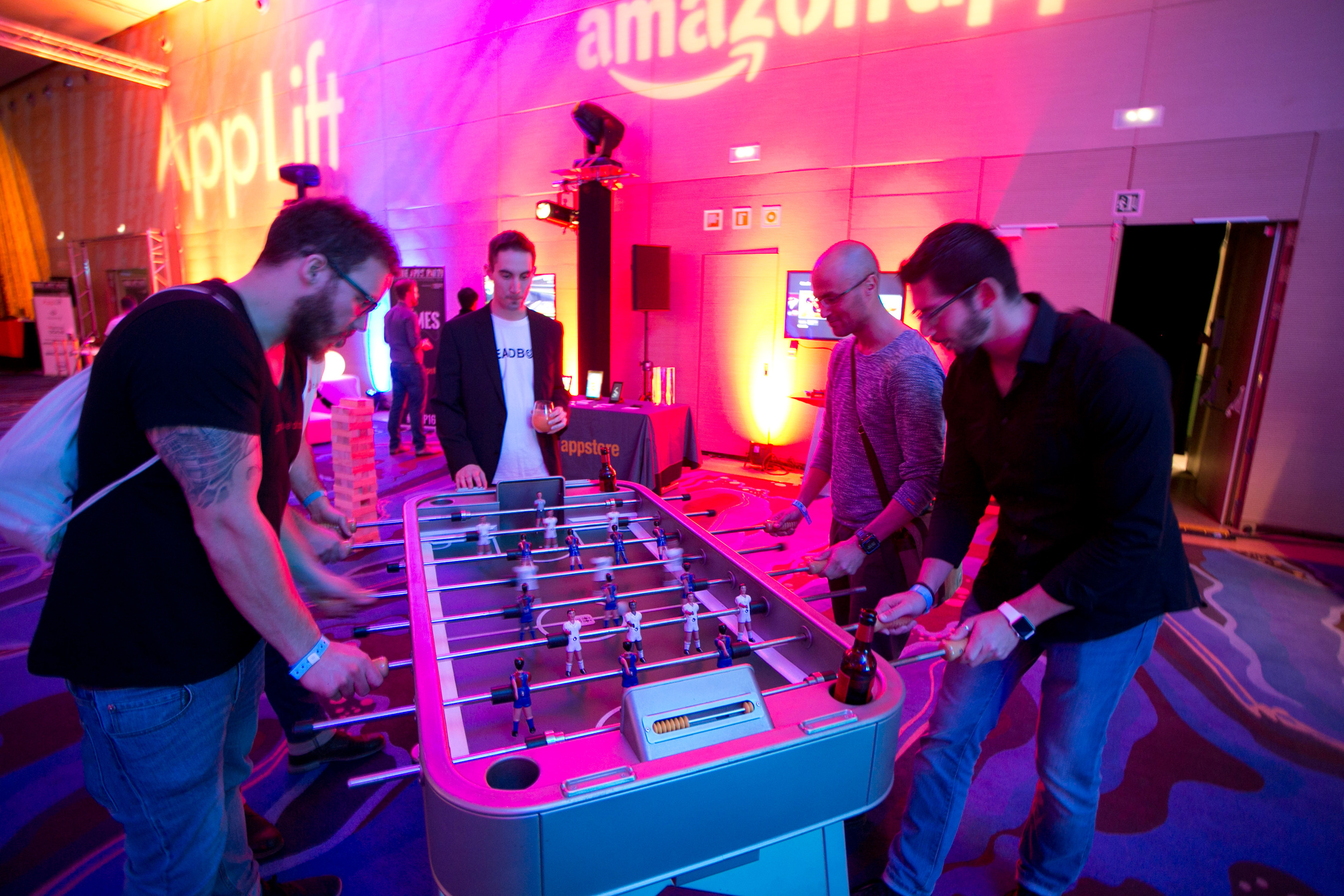 Guests play foosball in the Games area