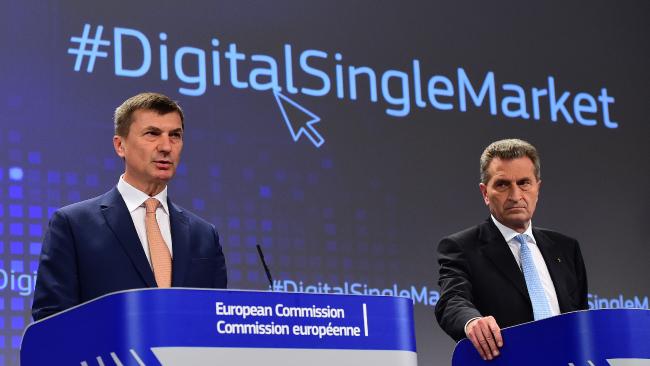 EU Digital Single Market Commissioner Andrus Ansip (L) with EU Digital Economy and Society Commissioner G ü nther Oettinger (R).
