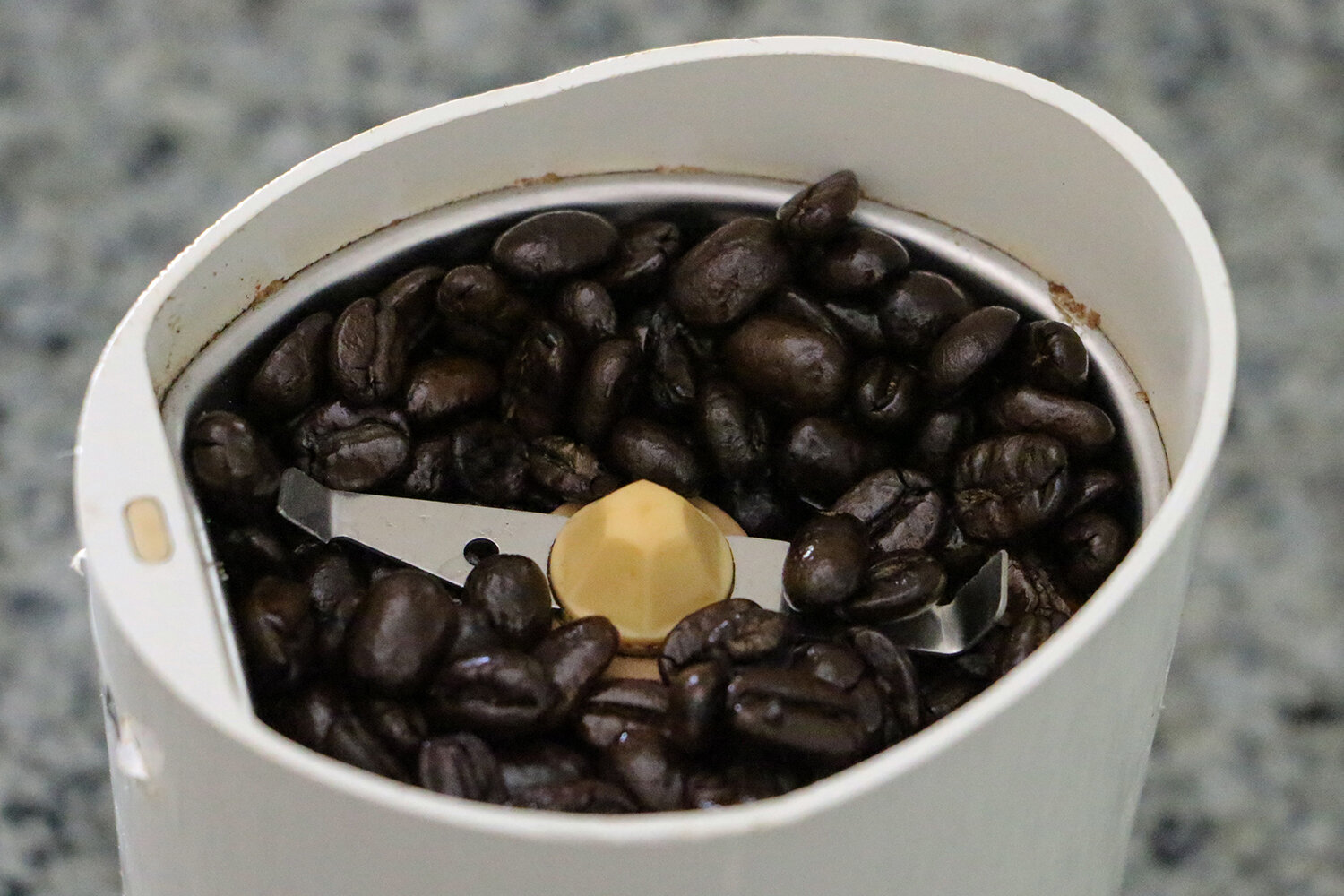 Grind fresh coffee beans