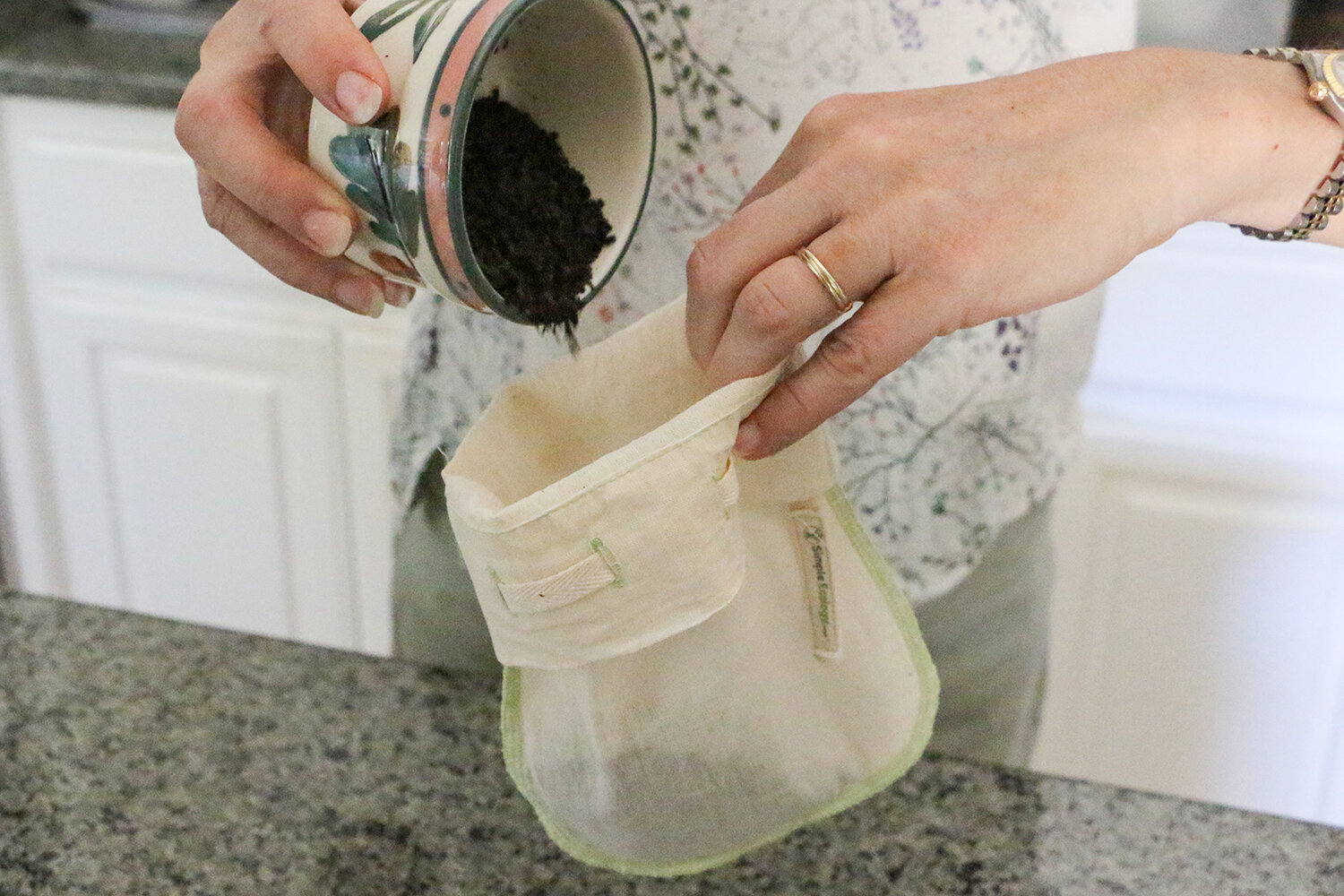 Place coffee grounds into a Reusable Straining Bag