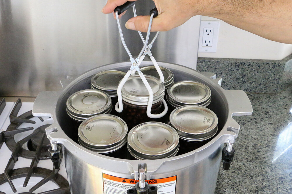 Remove jars from pressure cooker and allow to cool