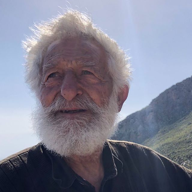 Yanis was sitting under a carob tree watching the hawks when I came across him. After exchanging kalimeras, he gestured to the ground beside him and passed me his old binoculars to better see the birds. We were high up, a steep two hour walk from Lou