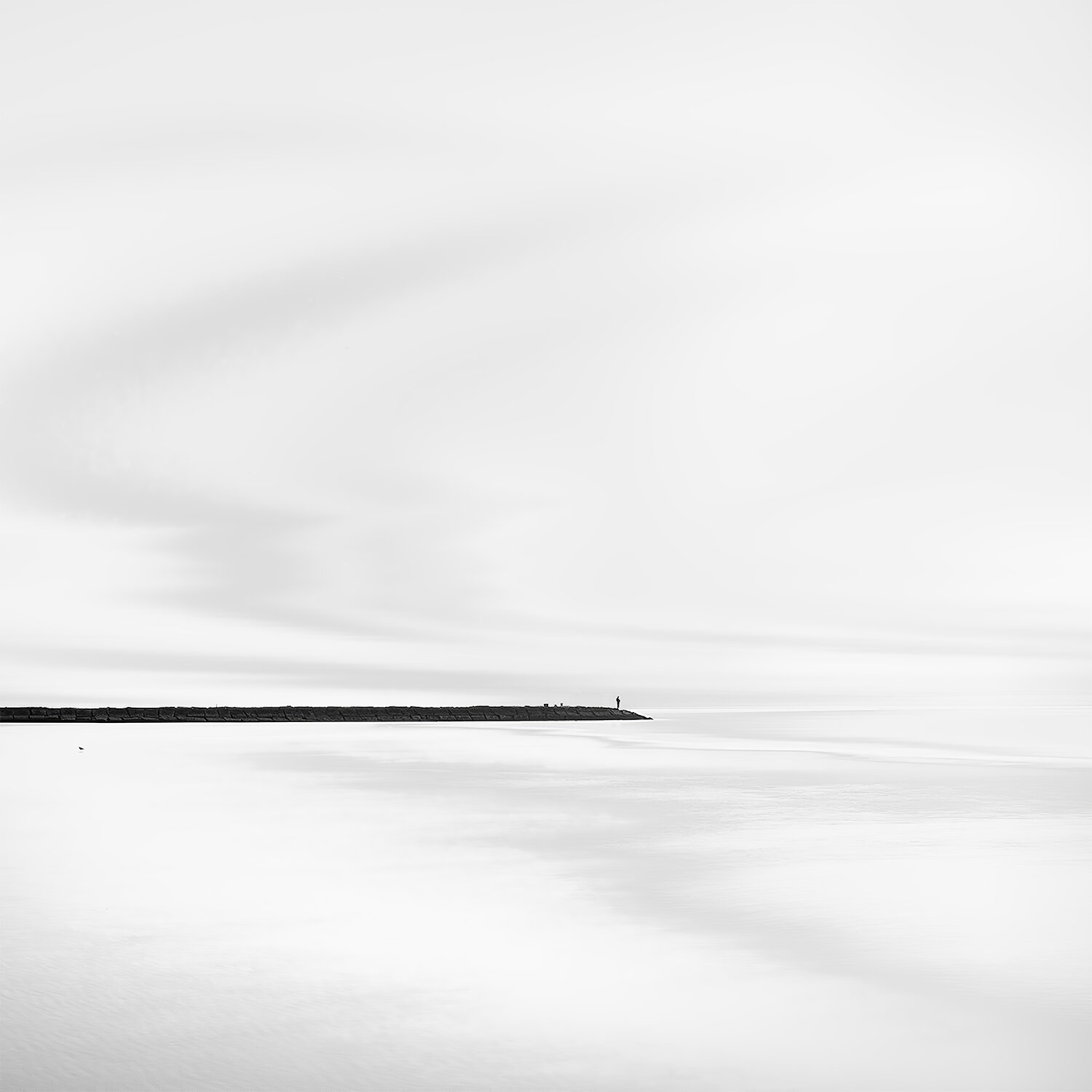 Seawall jetty and strange light