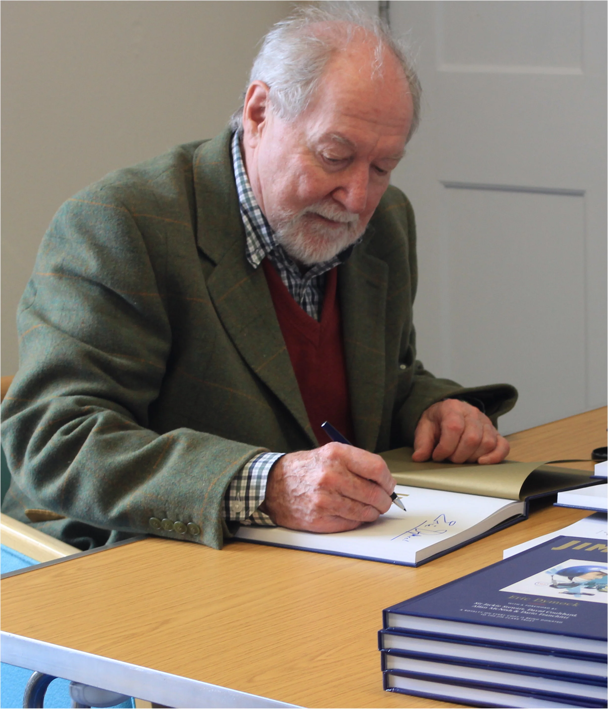 Author signs books