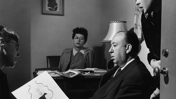 Here is Edith Head collaborating with Alfred Hitchcock