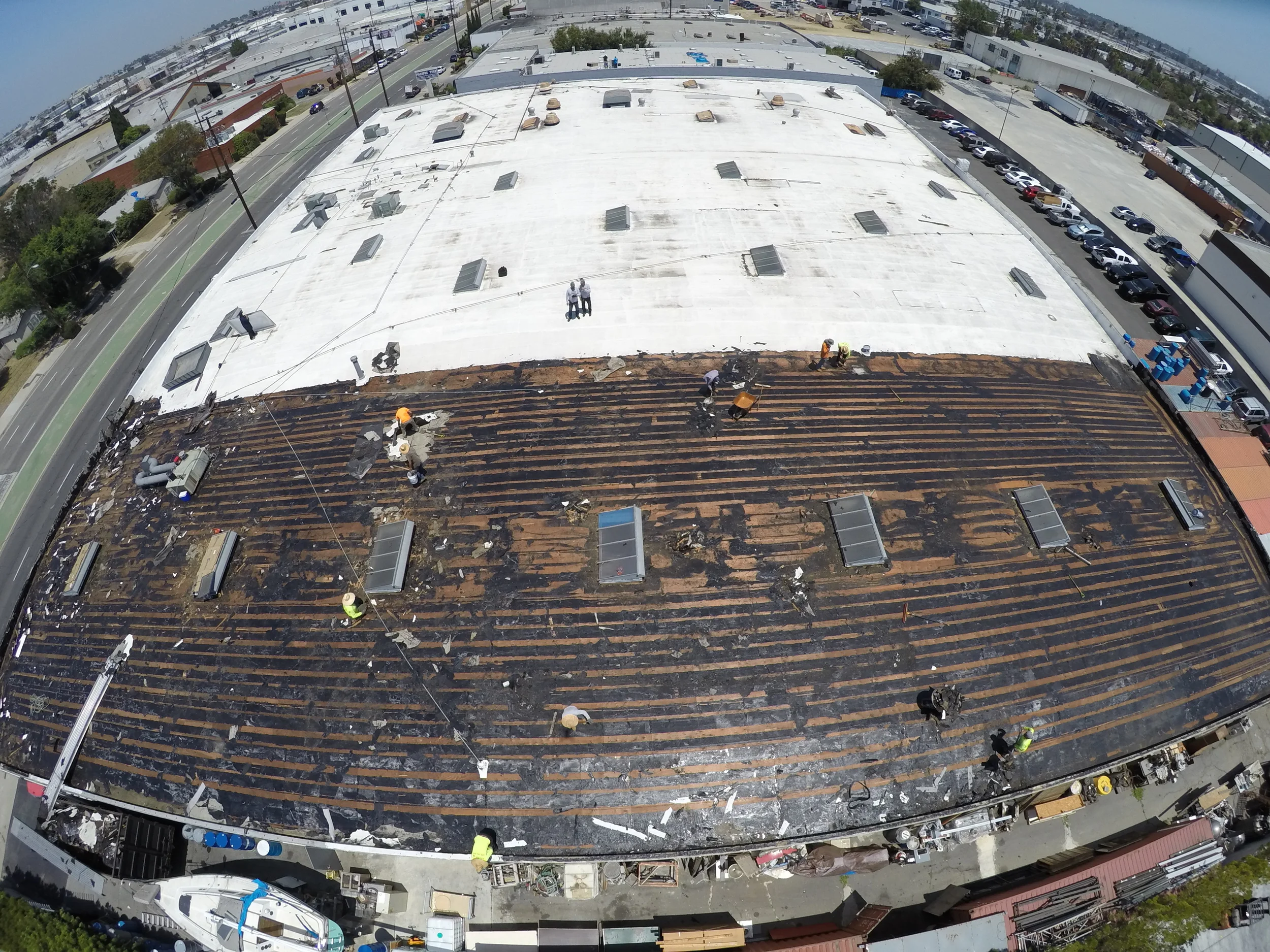 Tear Off 1st Section of the 2 capsheet layers roof