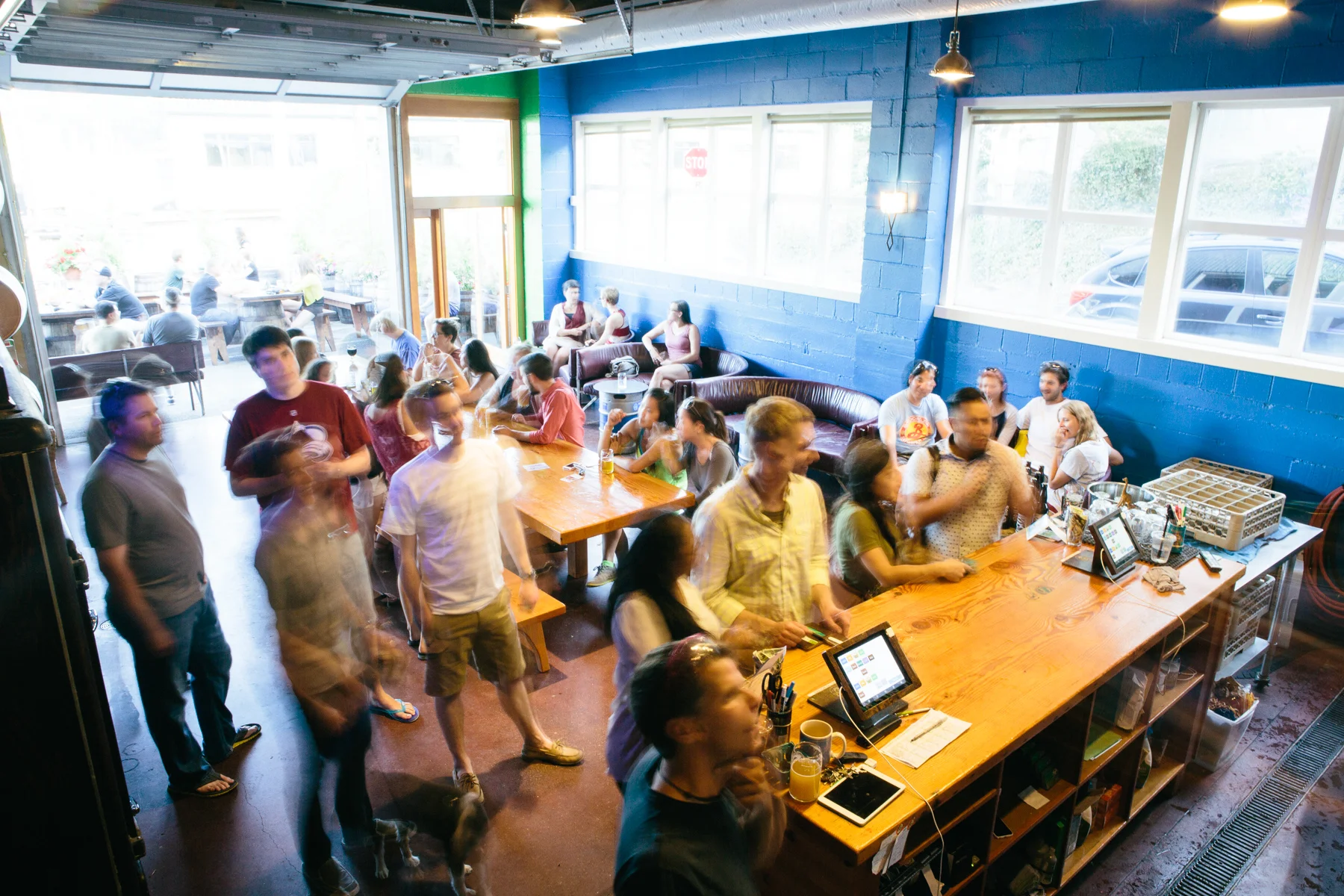 Customers looking at beer menu board