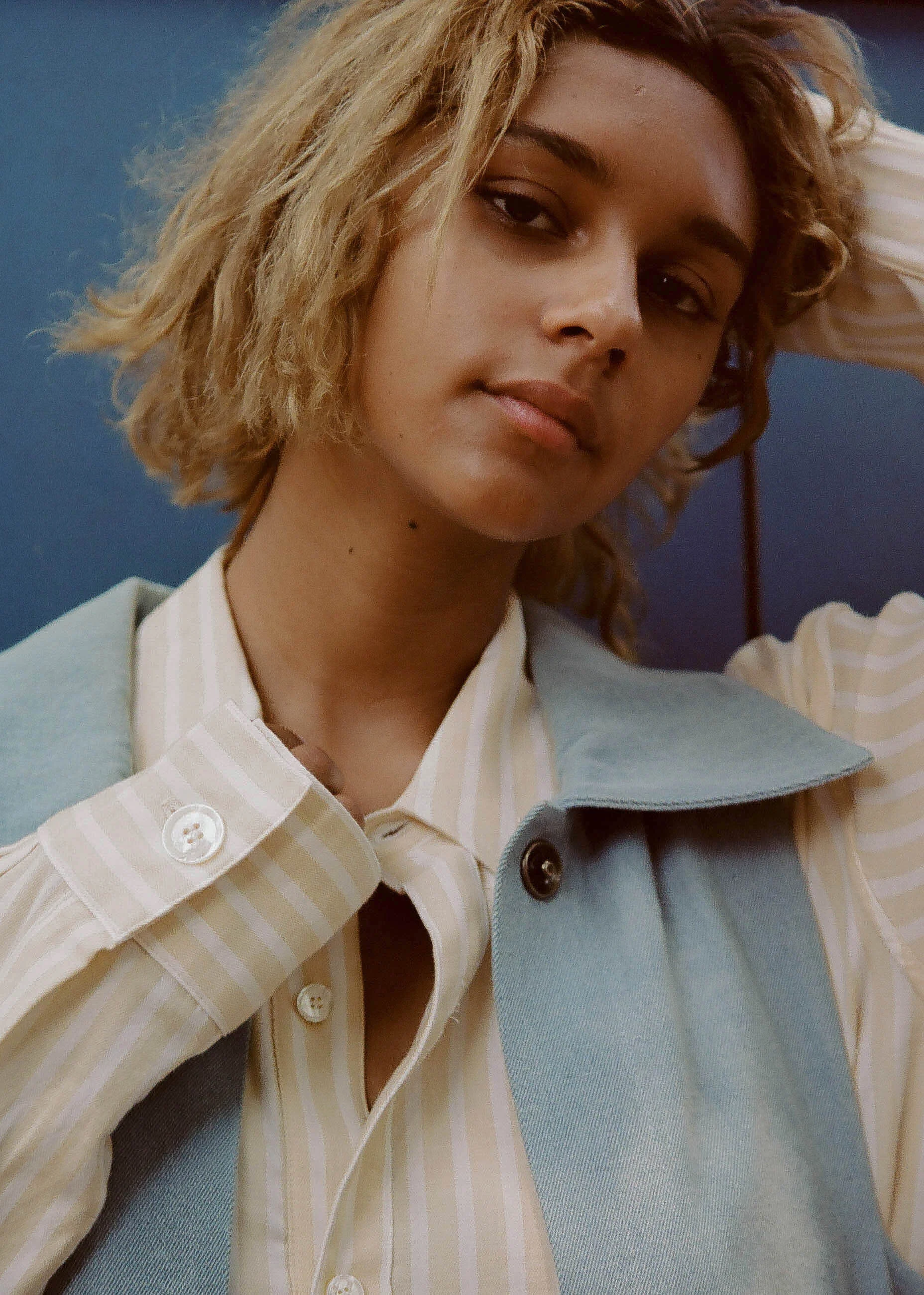 Cinematic portrait of Sunnaya Nash on a summer day; wearing Nancy Stella Soto and l'equip