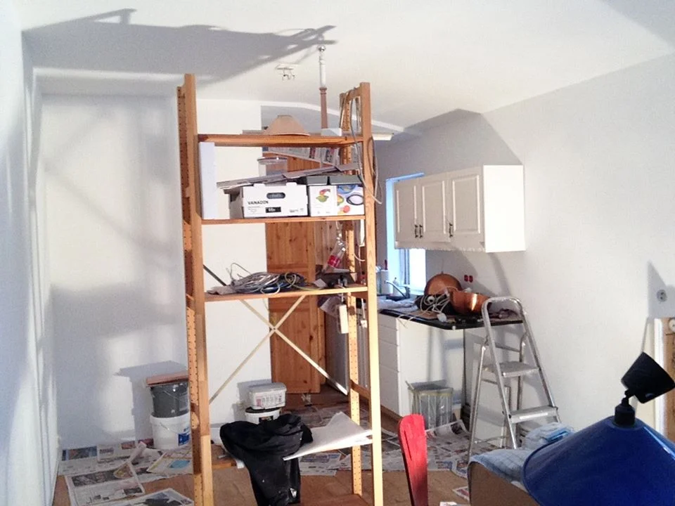 Those copper lights are going up in the room.