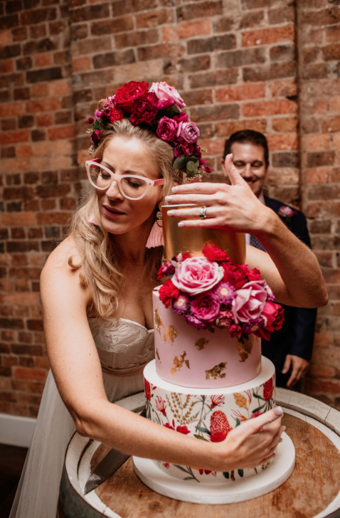 A bride so in love with her H&G creation. “You may now hug your cake…”