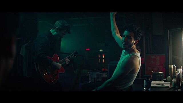 One more from Tommy that never made the cut. Dailies grade that always tended a little more toward a green/orange split. @sebastianyatra in a faux backstage area we built in Wembley arena. My ropey lighting plan I sent to @elliot_be on the second pag