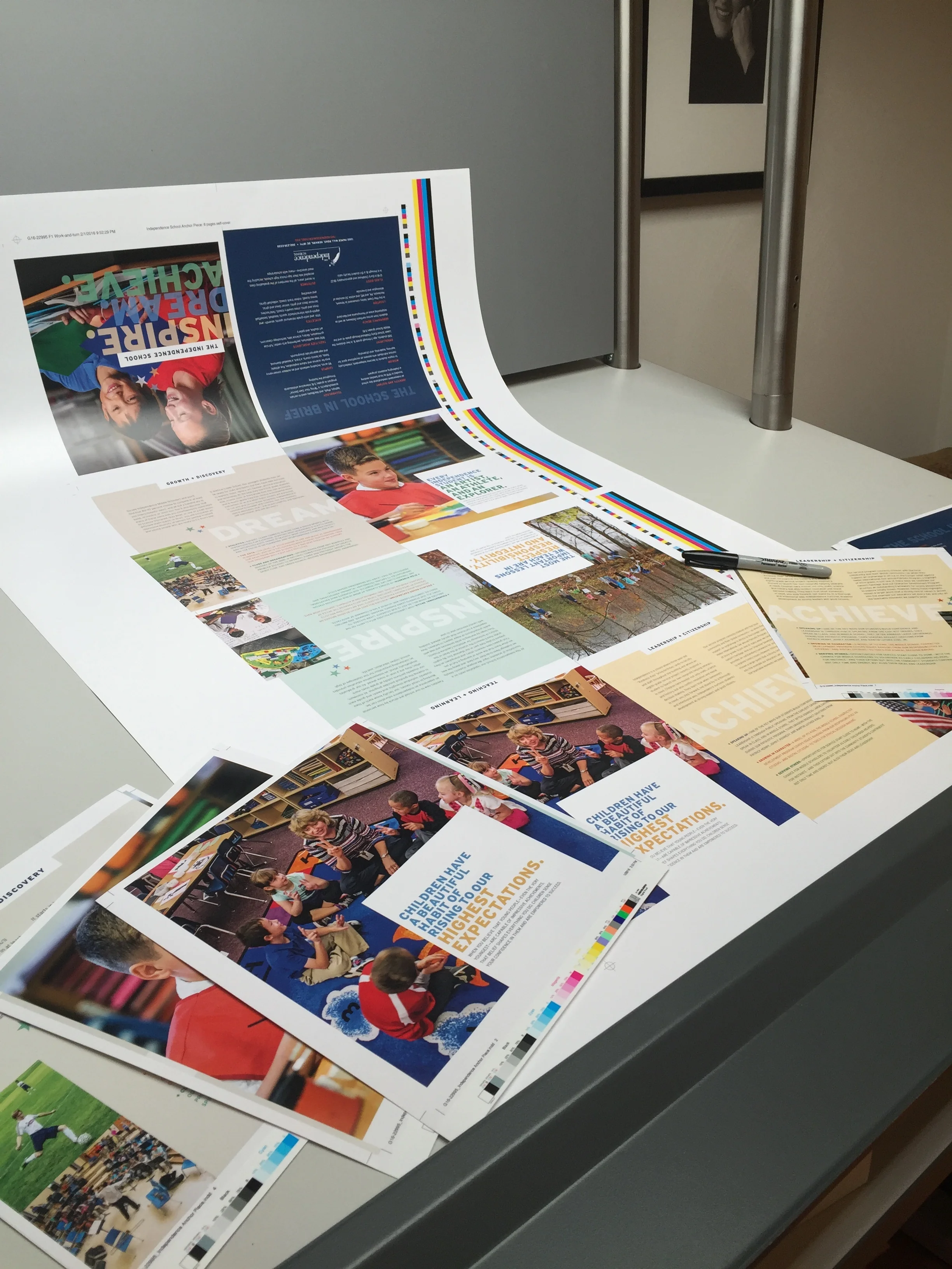 Comparing the composite proofs to the press sheets.
