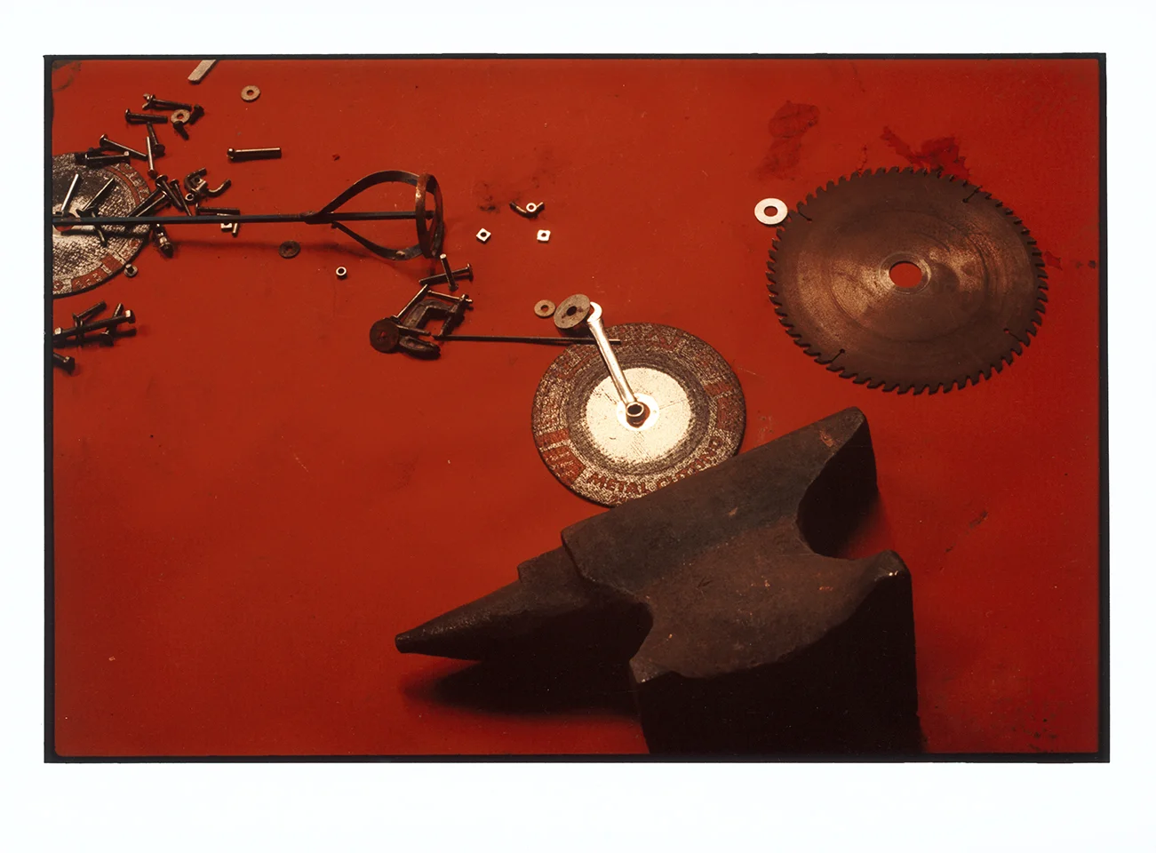 In 2016 my Father and myself collaborated in the last year when he was fighting for his life with Parkinson’s and Cancer. In his workshop he dropped this tin of bolts upon a worn torn canvas, blood red.