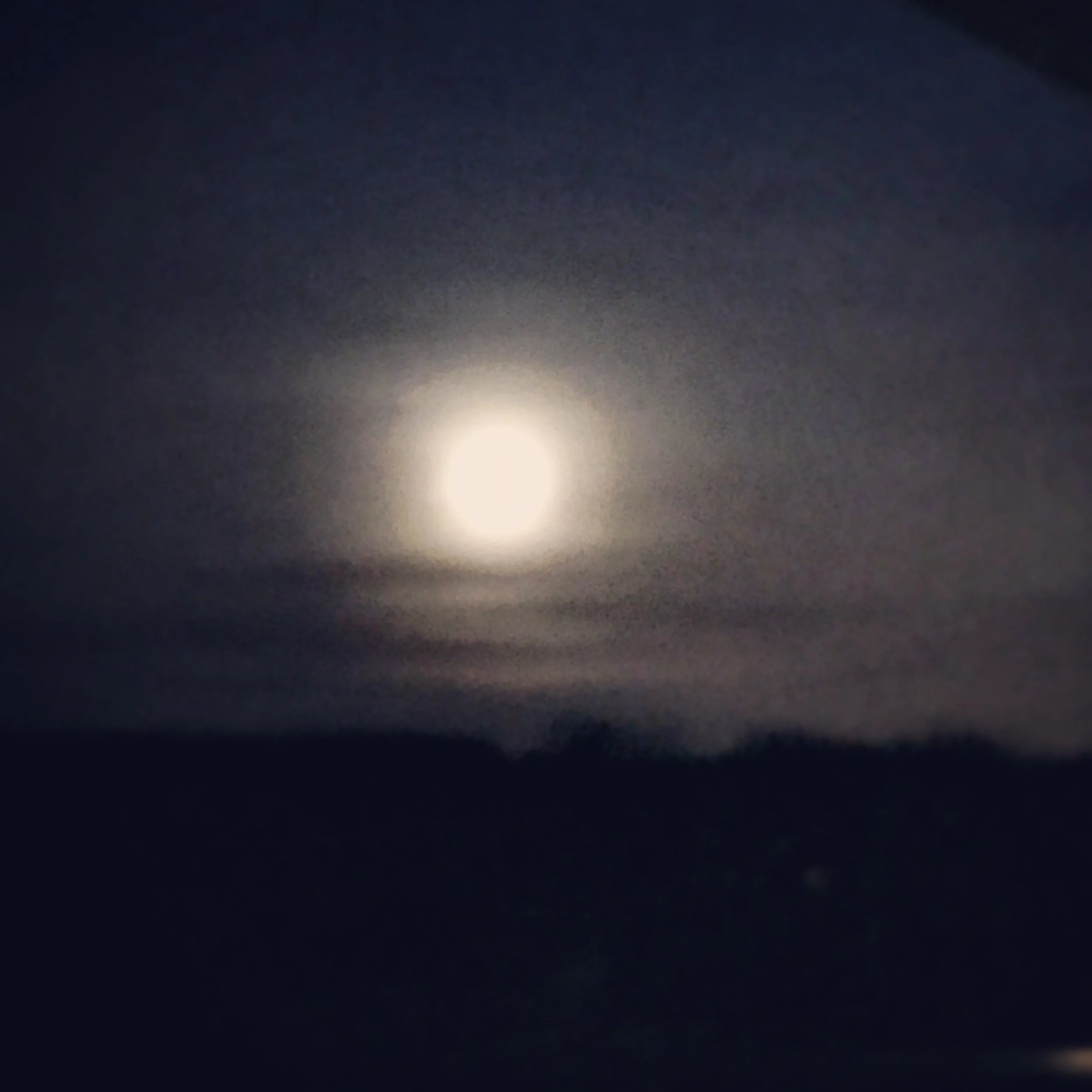 The full moon a few minutes before its partial eclipse.