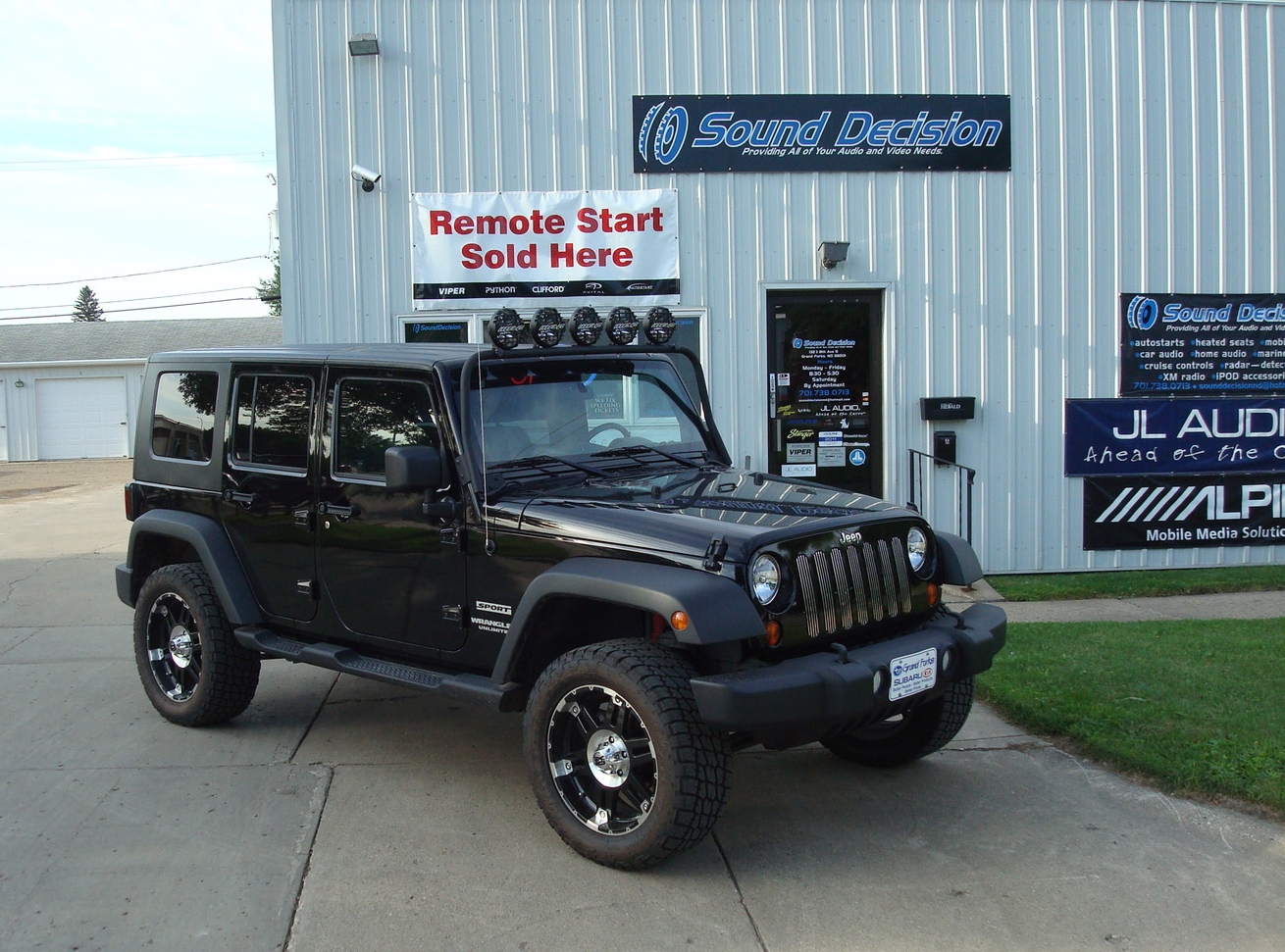 2010 Jeep Wrangler - Tower speakers added for radio station location broadcasts