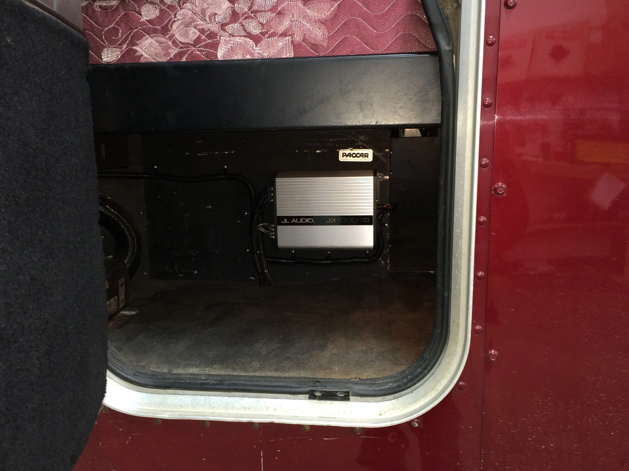JL Audio 1,000W Monoblock Amplifier hidden away