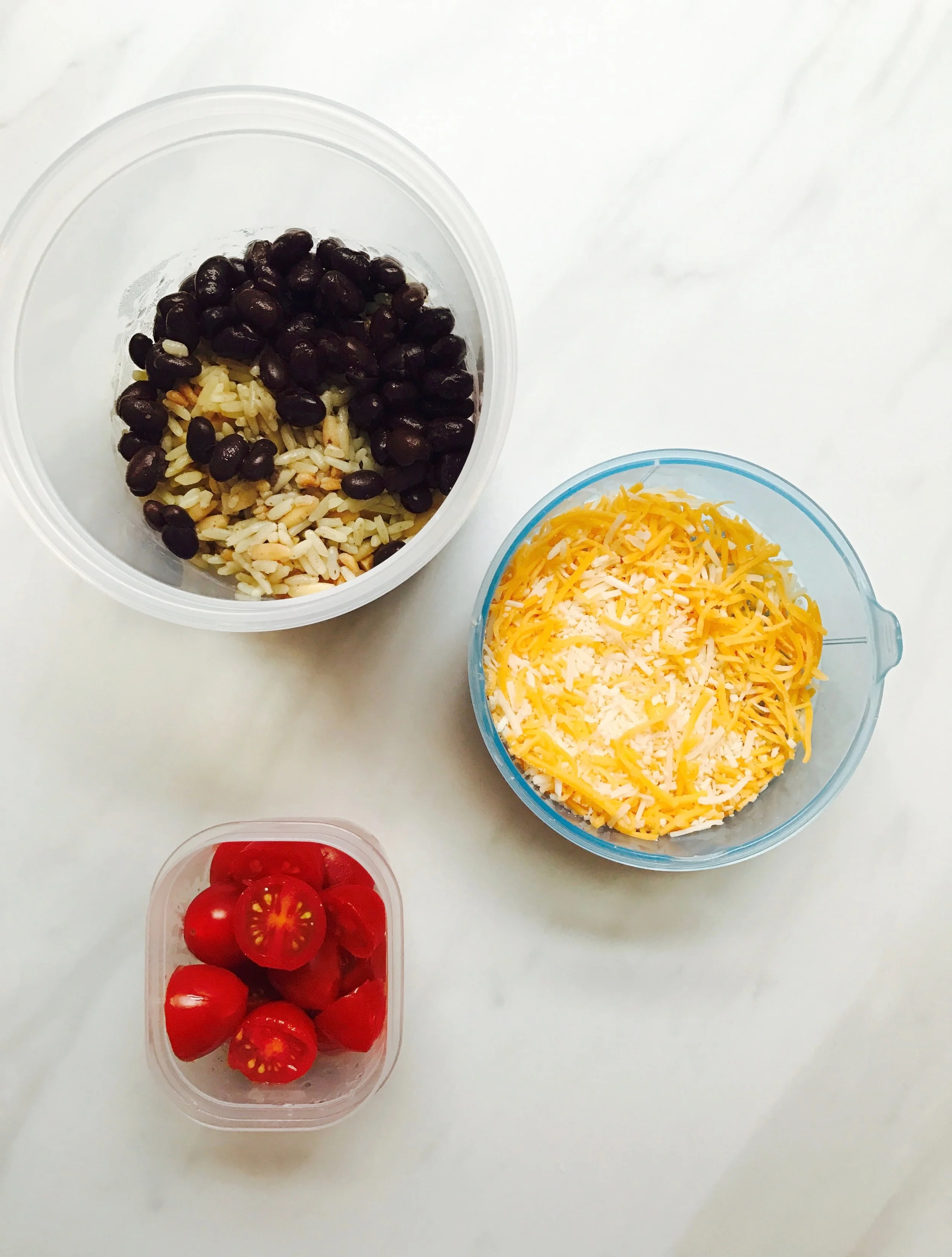 Black bean salad - black beans, rice, shredded cheese, and tomatoes. These are usually leftovers from dinner the night before so it's easy for me to pack. 