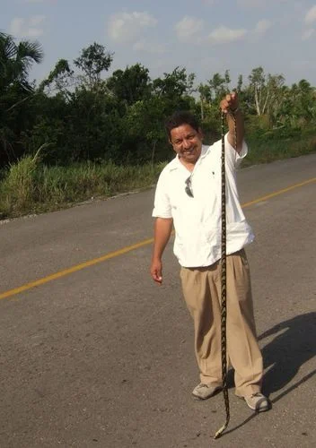 luis with snake.jpg
