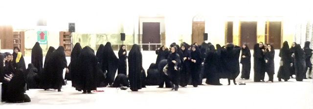 Line of women. Photo by Paul Ross