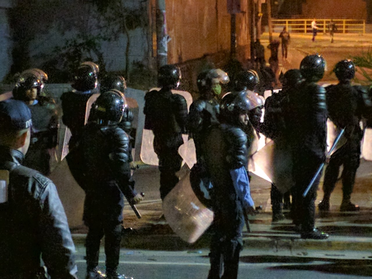 Riot police stand prepared in Honduras.