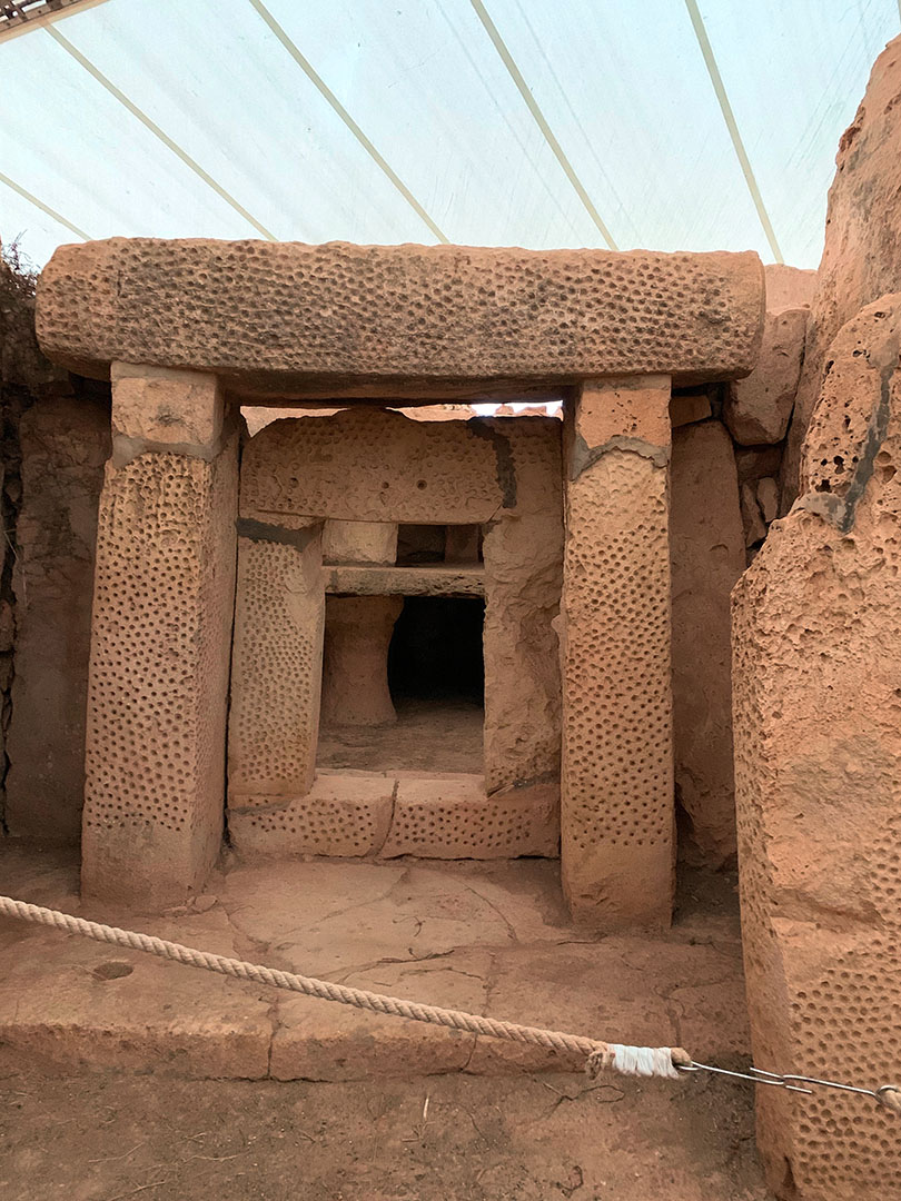  Deeply pecked patterns in side chamber inside Mnajdra Temple. 