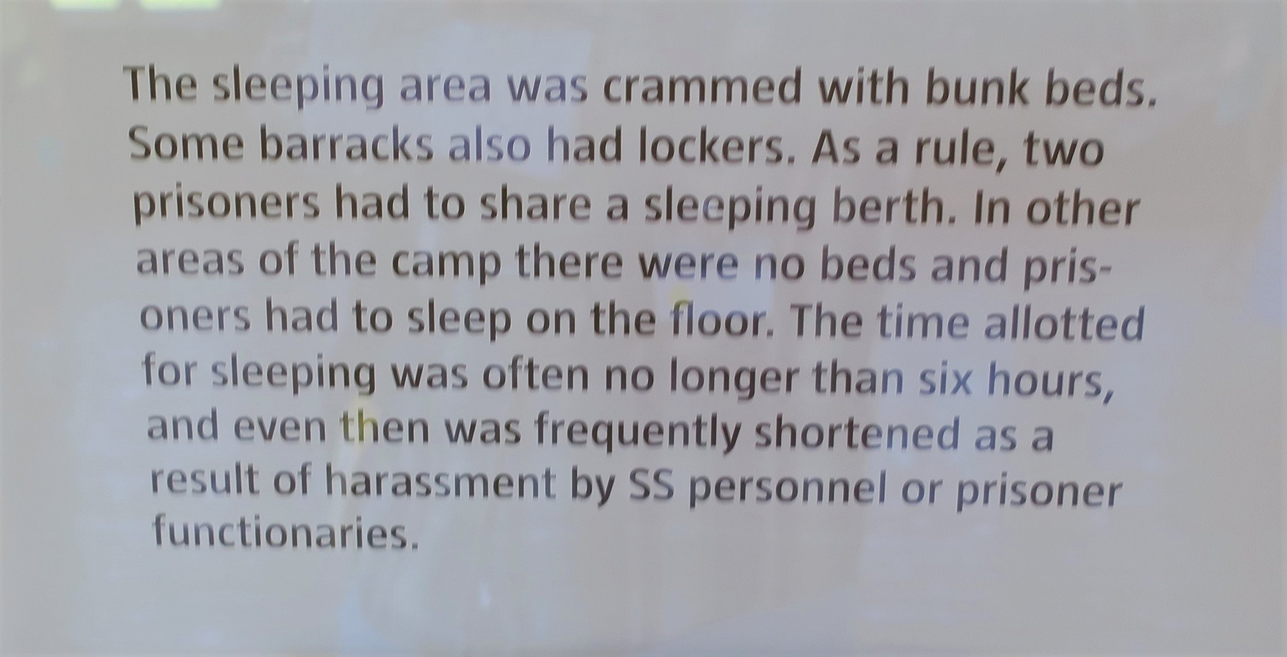 Descriptive sign about barracks conditions.