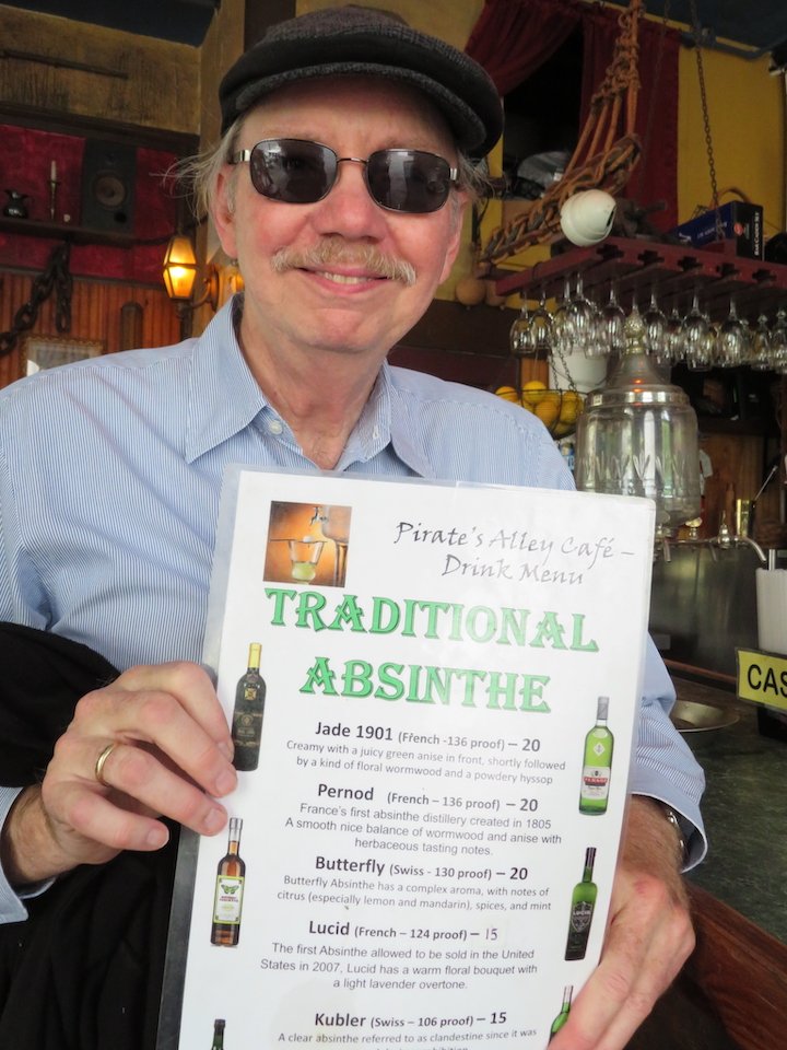 4. Pirate Alley Terry holding Absinth menu.jpg