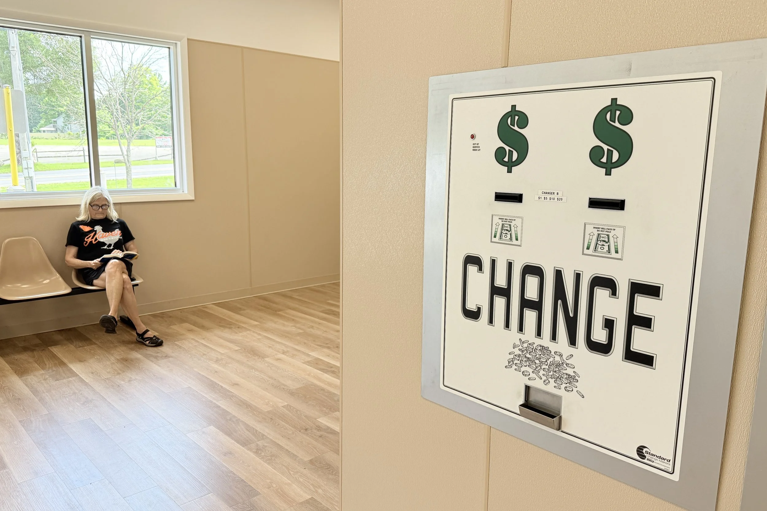  Change machine with the author's wife reading her novel 
