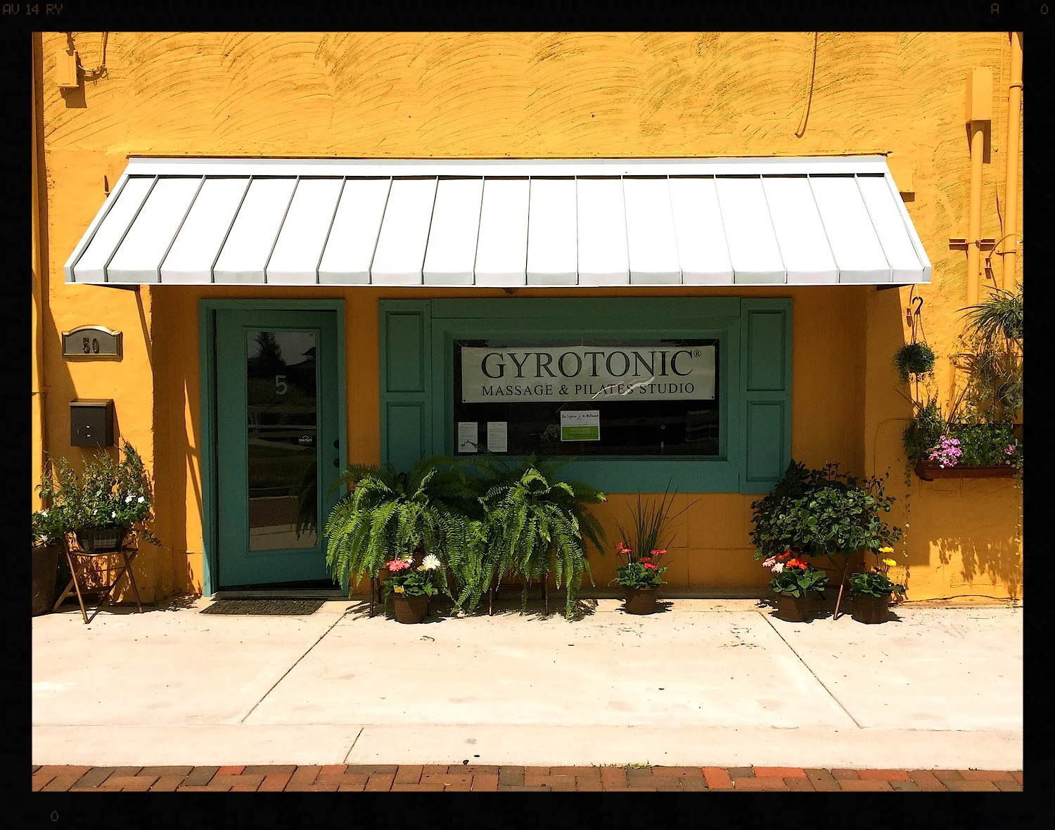 We are located in Historic Downtown Norcross, and while there is access to our studio from S. Peachtree St., our main entrance is on Skin Alley .