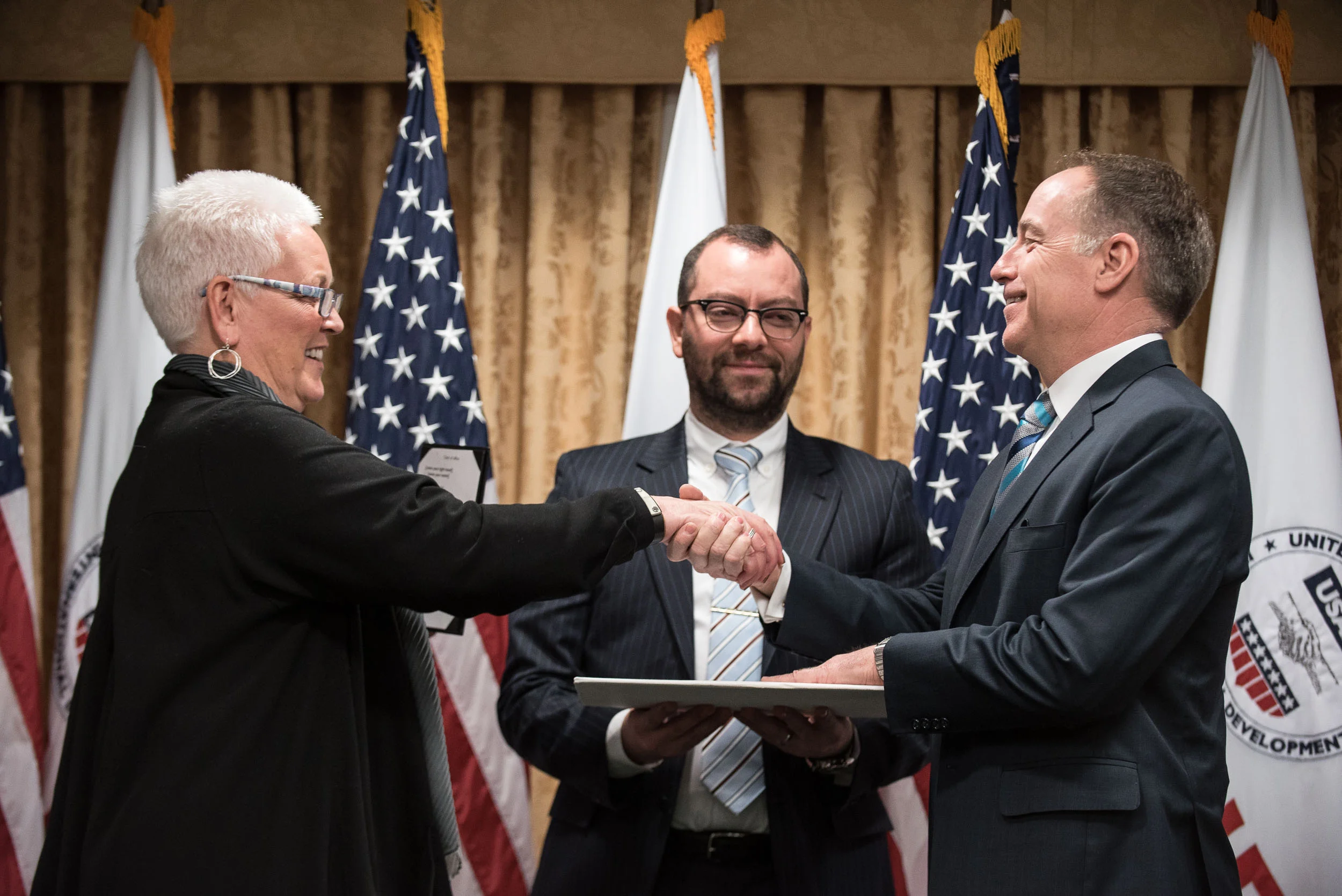 Jene Thomas is sworn in as Mission Director to Uganda by Administrator Gayle Smith