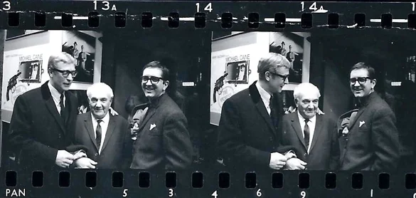 Michael Caine, cinematographer Otto Heller, and Len Deighton. Contact strip of rarely seen photographs by Jack Nisberg outside London’s Leicester Square Theatre at the opening of The Ipcress File on 18 March 1965.© Jack Nisberg / Roger-Viollet . No reproduction without permission. Jack Nisberg (1922-1980) was a freelance American photographer who worked mainly for Look , Newsweek , The Observer, The New York Times , The Sunday Times , Elle and Vogue . After moving to Paris in 1955, he became a sought-after photographer for cultural, political and social events, in addition to photojournalistic assignments. A friend of Len Deighton, he was also on hand to photograph the only meeting of Deighton and Ian Fleming at a luncheon hosted by Peter Evans in March 1963. Jack Nisberg’s work is being rediscovered by cultural historians and collectors, and his archive is now managed by the French agency Roger-Viollet.