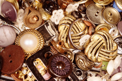 Shown: vintage gold buttons items that can be recycled profitably by GoldRefiners.com, part of Specialty Metals Smelters & Refiners.