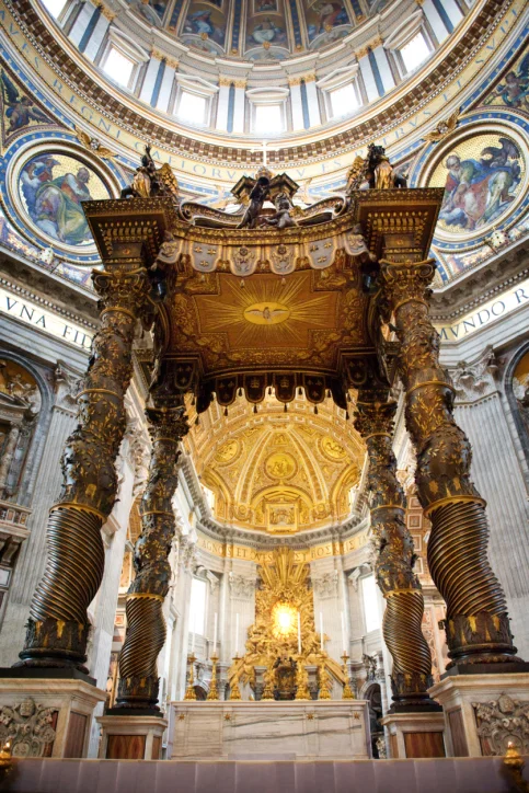Shown: the inside of St. Peter's Basilica in the Vatican in Rome shimmers with just some of the gold the Catholic Church owns, as described in this blog post for GoldRefiners.com.