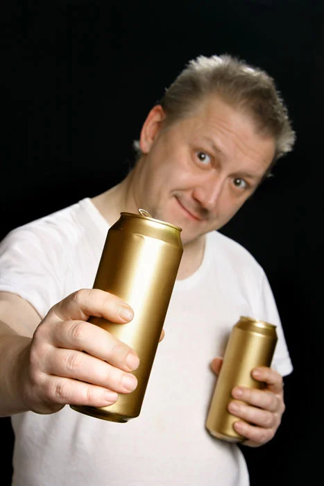 William Strimp shows off his golden cans. (And no, we were not brave enough to taste what was inside!) Credit: zoom-zoom/iStock.
