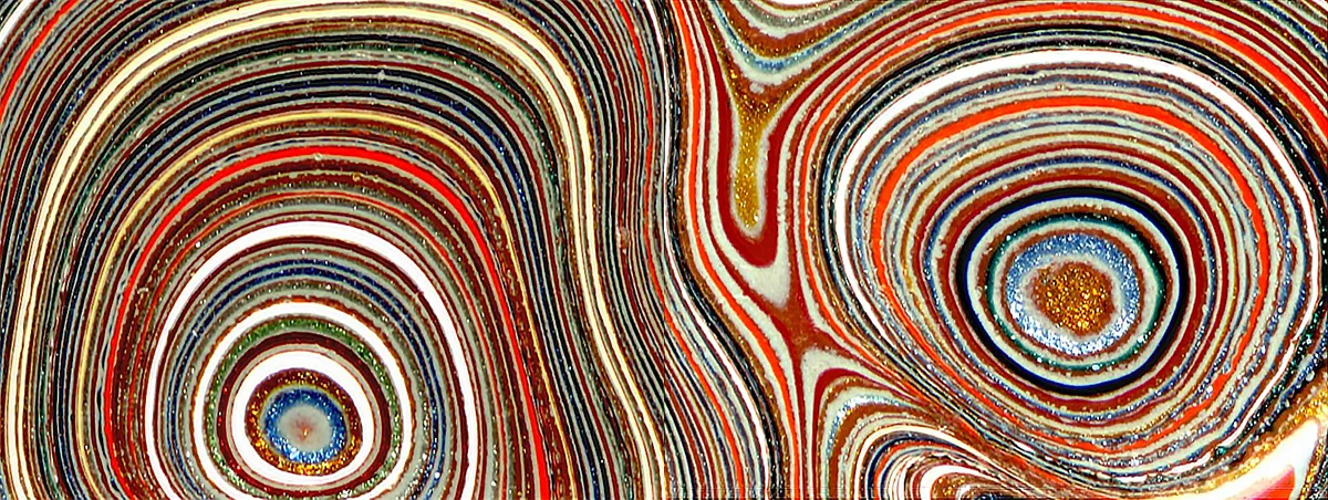 Picture of Fordite (automotive paint), image via flickr user nebbie