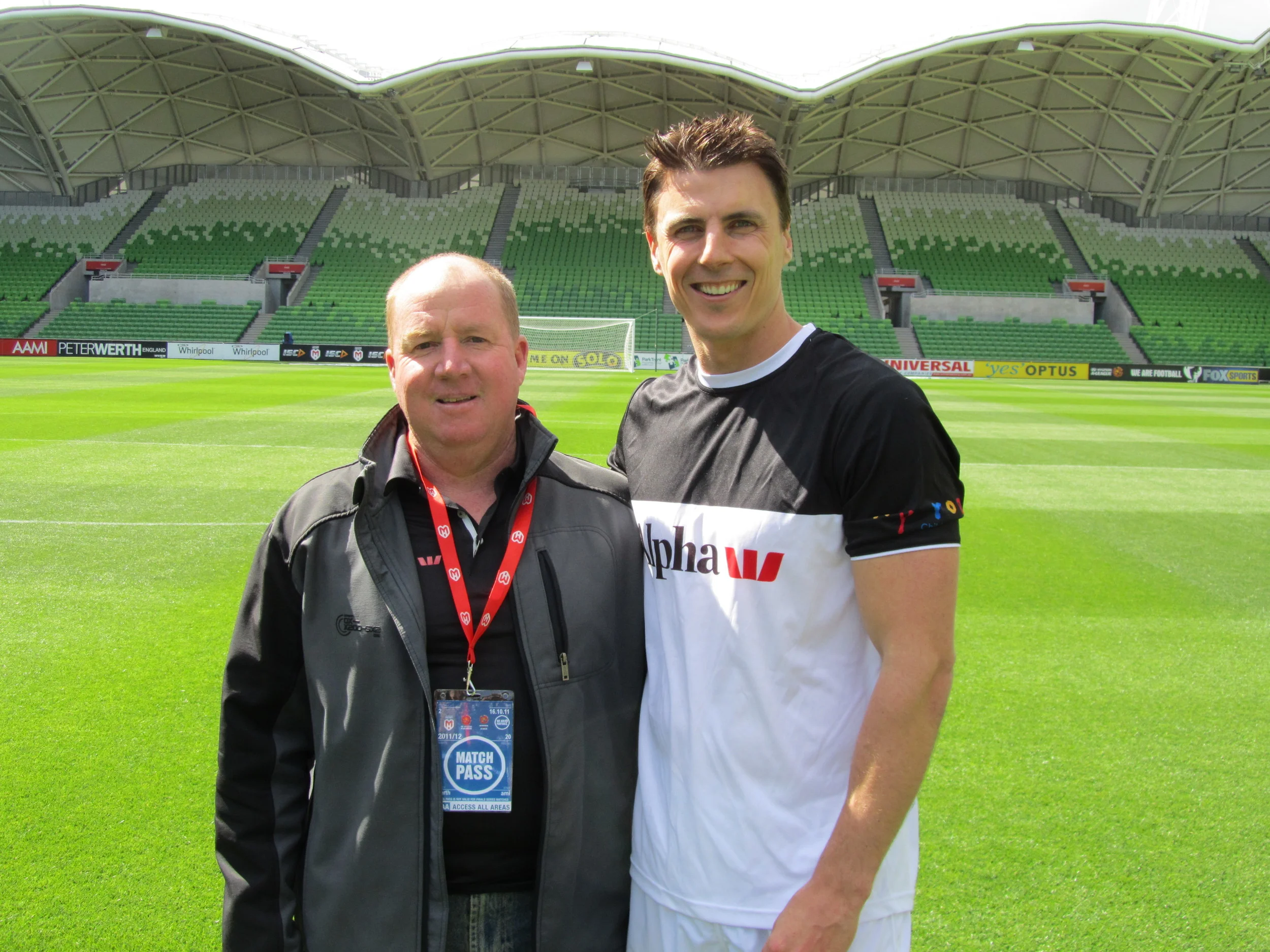 Warren with AFL legend Matthew Lloyd
