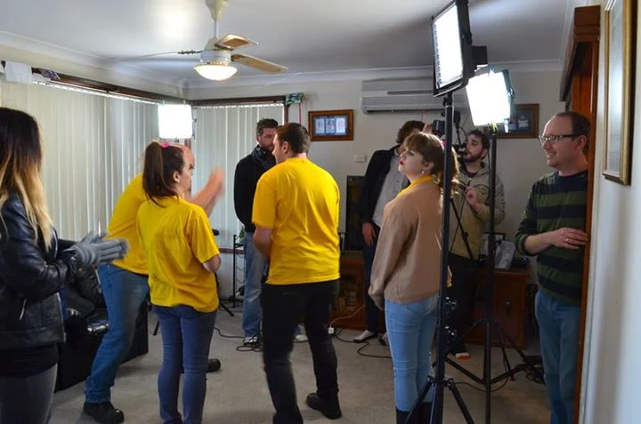 A indoor setup. Lit with LED panels using 1/4 cto gels on them to add some life to the skintones of the actors