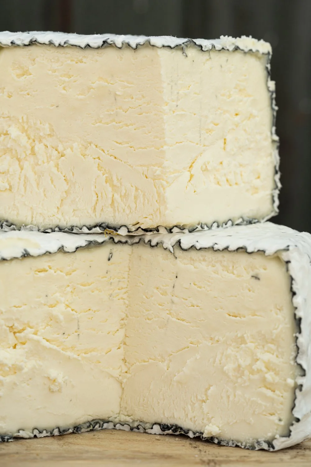 Cross-section of Witchgrass, a tart lactic cheese ripened with vegetable ash, from Valley Milkhouse CreameryZS_ValleyMilkhouse_053.jpg