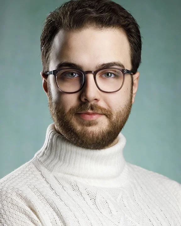 Jacob Headshot white RS web.jpg