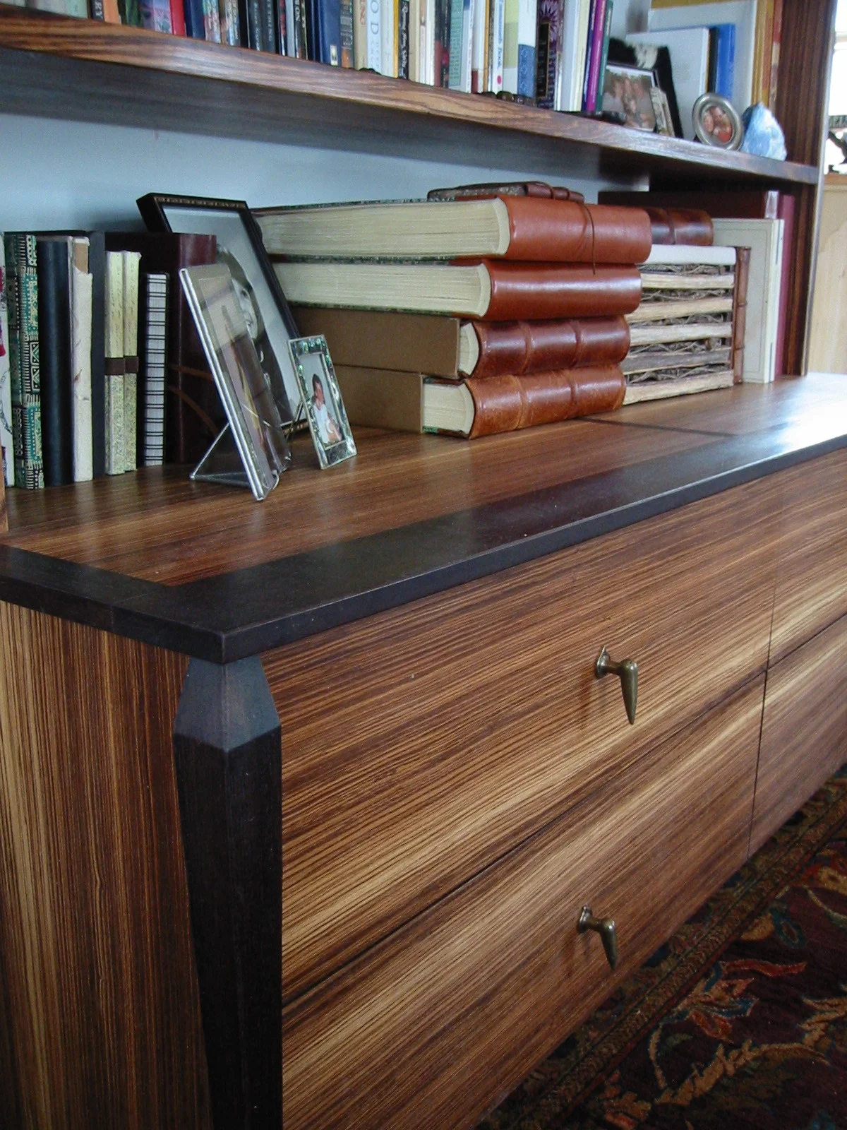  Zebrawood and wenge bookcase. 