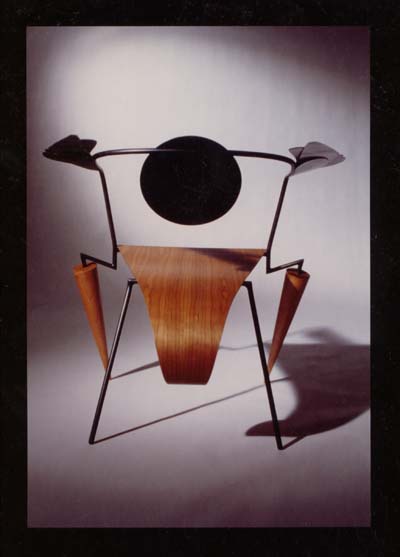 Bug Chair. Gun-blued steel and cherry.