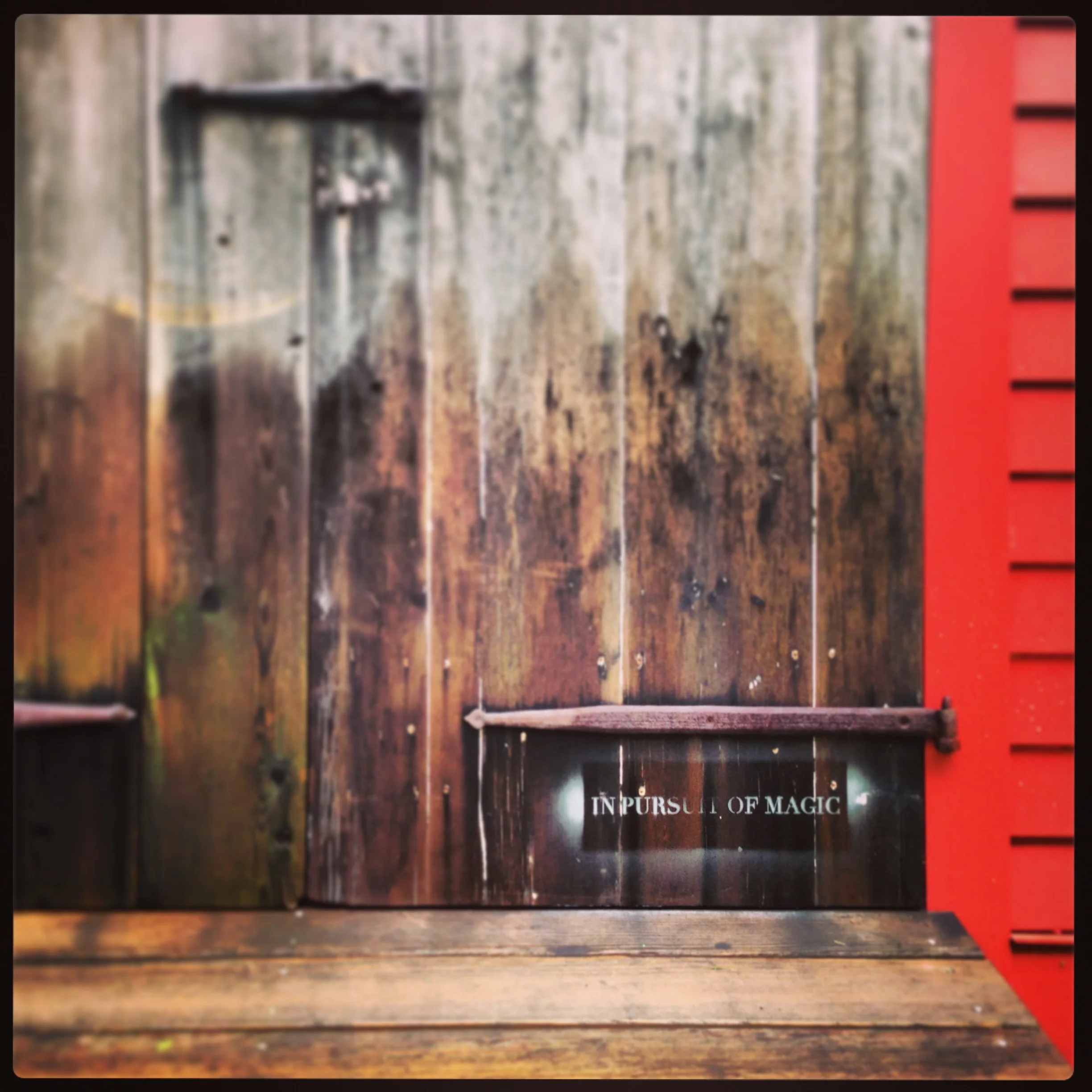  Shed door constructed from reclaimed wood. 