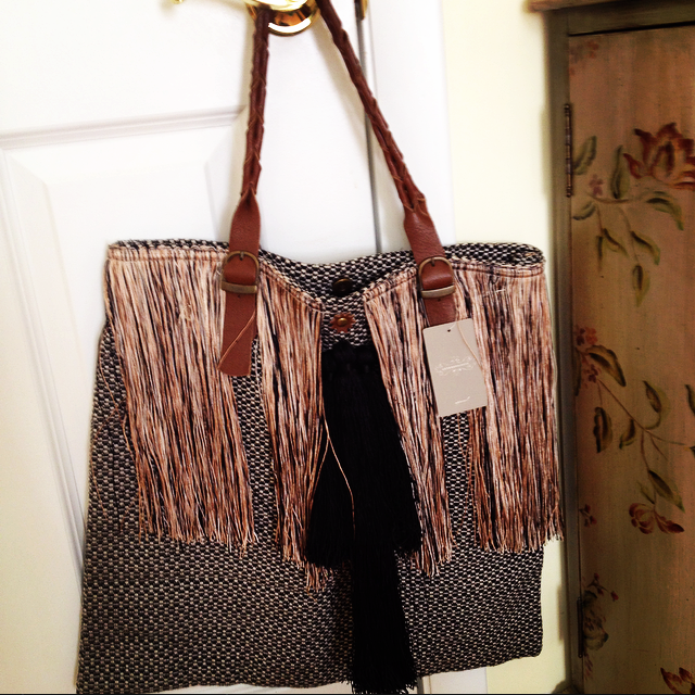 The safest way to wear fringe is on a handbag.
