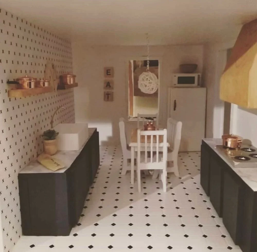 A dollhouse kitchen that Carolyn recently redesigned.