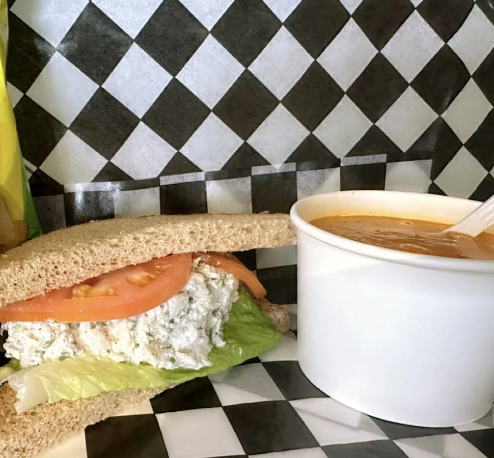 A Deli With Delicious Sandwiches That Overlooks The Newport Bridge 