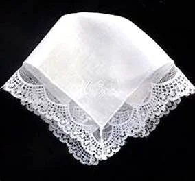 white laced handkerchief on black background