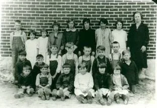 Image of Mabel Shaw's class of children sitting for a group picture