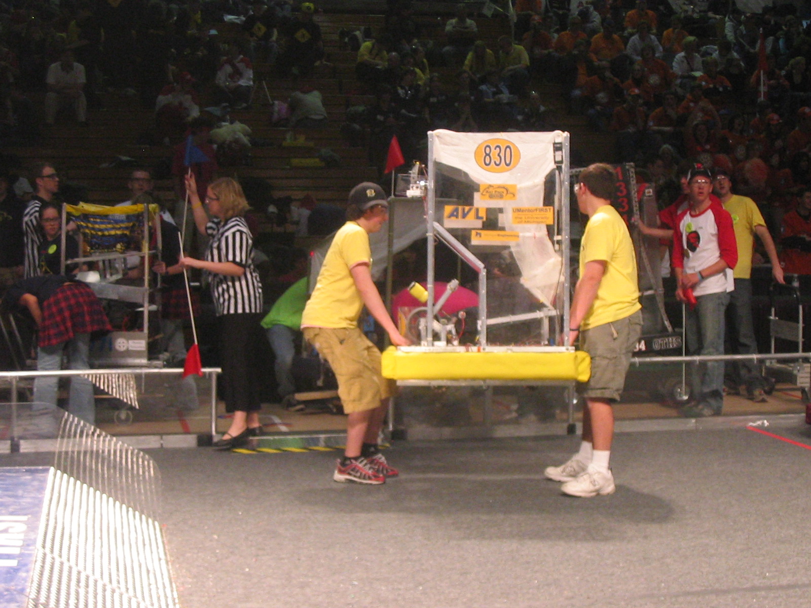 The 2006 drive team carrying the robot off the field.