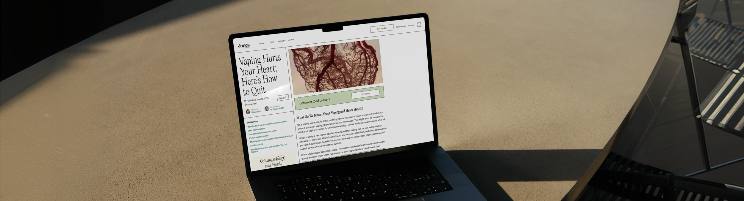 A laptop on a beige table displaying an article titled 'Vaping Hurts Your Heart; Here’s How to Quit' with an image of a heart and blood vessels, and a sidebar of related links.