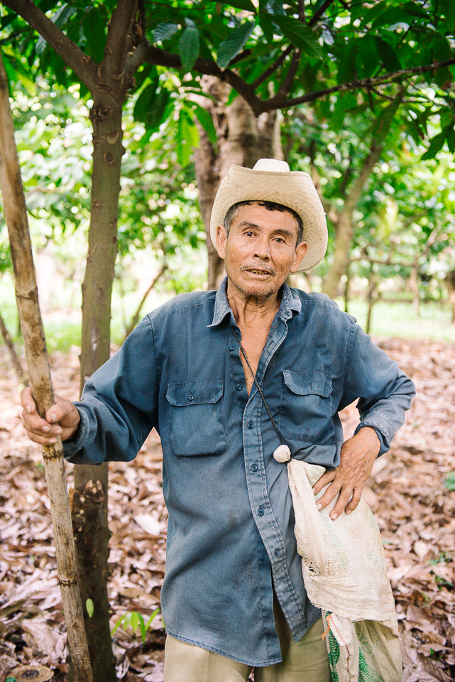 I asked to split from the group to meet some of the cacao farmers, so we sped off on an ATV into the cacao groves to photograph them at work. 
